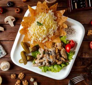 This Chicken with Mushrooms, Rice, and Crispy Tortilla Chips is a simple yet satisfying meal, bursting with flavors. 